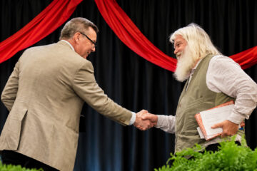 Martin Cothran presents the 2026 Parnassus Prize to poet Malcolm Guite at the Memoria National Conference.