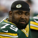 Ryan Pickett on the Green Bay Packers sideline during a game.