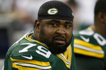Ryan Pickett on the Green Bay Packers sideline during a game.