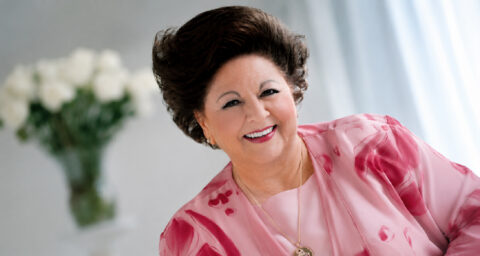 Vestal Goodman smiling in a pink floral outfit.
